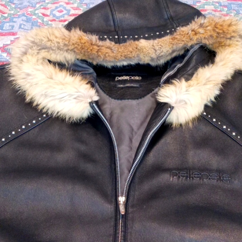 Mark Buchanan pelle pelle, blackleather,long sleeve, fur trimmed hooded jacket.